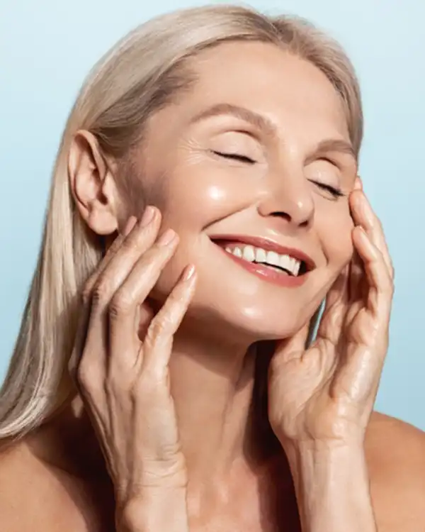 Gorgeous senior older woman with closed eyes | Northeast Medical Aesthetics | Peptide Therapy